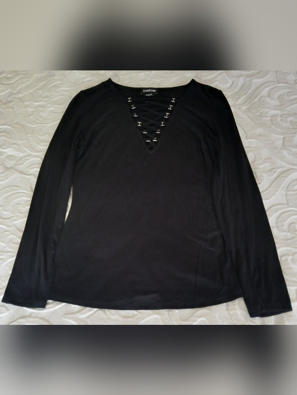 bebe Black Long-Sleeve V-Neck Top with Metal Lace-Up